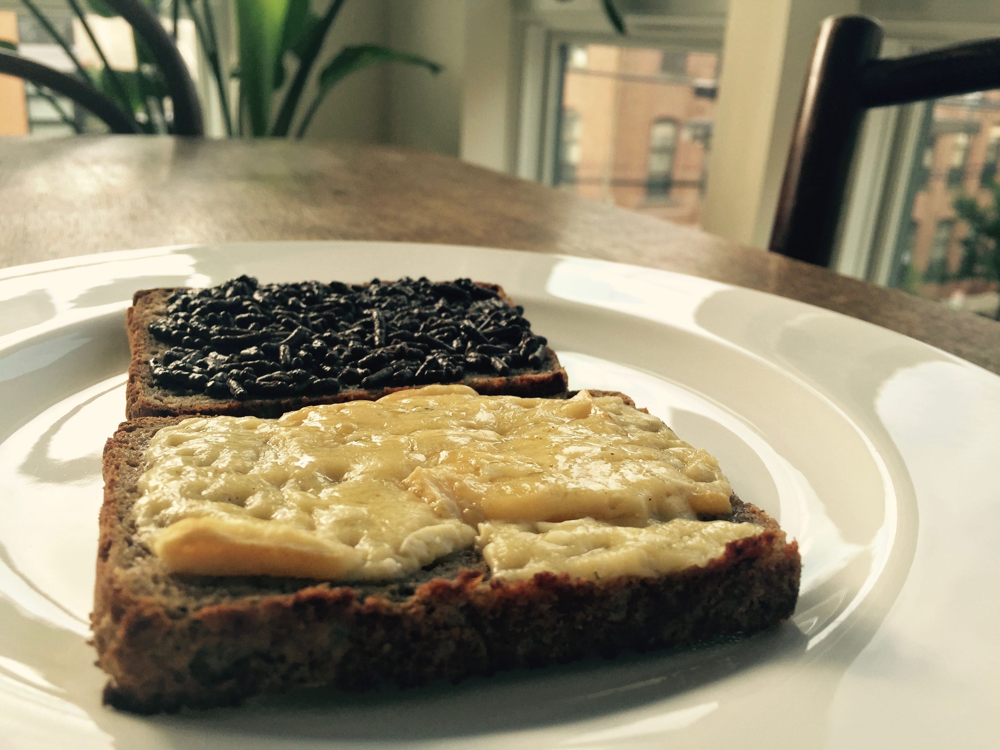 Slices of sourdough bread toasted with 1. cheese and 2. chocolate sprinkes